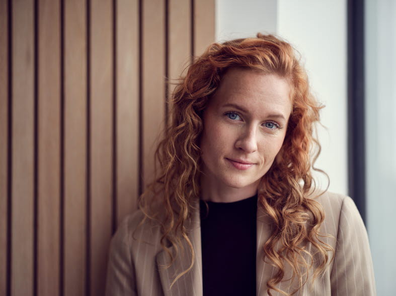 Picture of a woman smiling towards the camera